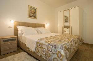 Voodi või voodid majutusasutuse Apartment Lenka- Split toas