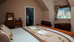 Postel nebo postele na pokoji v ubytování Glen Clova Hotel & Luxury Lodges