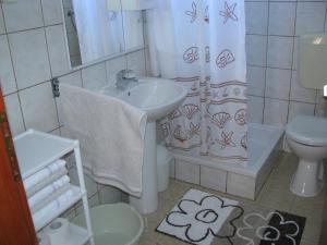 Koupelna v ubytování Apartments Šparada Mladen