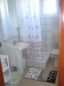 Koupelna v ubytování Apartments Šparada Mladen