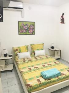 a large bed in a room with at Villa Kapiopa in Sainte-Anne +22 photos