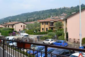 a group of cars parked in a parking lot at Torri Centro in Torri del Benaco