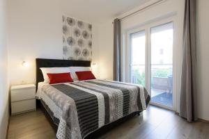 מיטה או מיטות בחדר ב-Apartment Relja