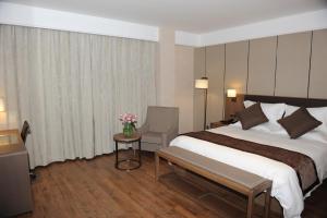 Cama o camas de una habitación en Atour X Hotel Shanghai Hongqiao Airport Konggang Road