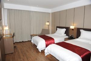 Cama o camas de una habitación en Atour X Hotel Shanghai Hongqiao Airport Konggang Road