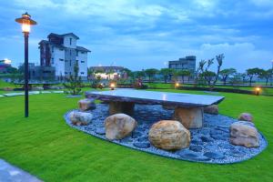 Vrt ispred objekta Qi Li Xiang Homestay