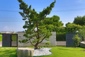 Vrt ispred objekta Qi Li Xiang Homestay