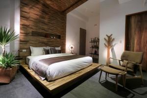 Postel nebo postele na pokoji v ubytování Qi Li Xiang Homestay