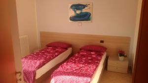 Ein Bett oder Betten in einem Zimmer der Unterkunft Casa Torboli