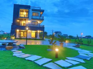 Vrt ispred objekta Qi Li Xiang Homestay
