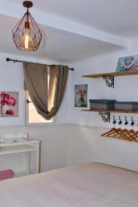 Cama o camas de una habitación en Nuitées Aixoises