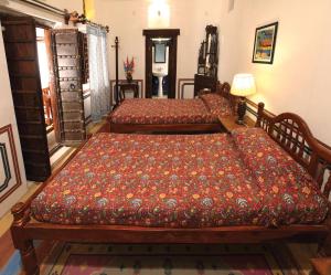 Cama o camas de una habitación en Hotel Mandawa Haveli