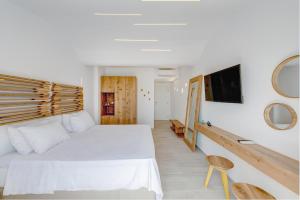 Cama ou camas em um quarto em Makis Place