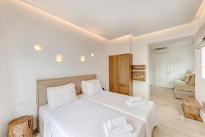 Cama ou camas em um quarto em Makis Place