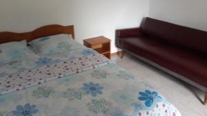 Postel nebo postele na pokoji v ubytování Casa Dexter