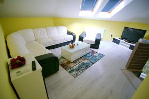 Posezení v ubytování Centrum Lux Apartman
