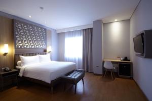 A television and/or entertainment centre at ibis Styles Cikarang