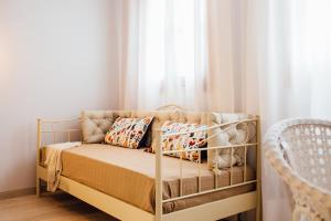 Postel nebo postele na pokoji v ubytování OttoH Charm Stay
