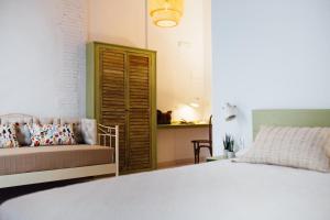 Postel nebo postele na pokoji v ubytování OttoH Charm Stay