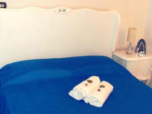 Postel nebo postele na pokoji v ubytování ZO. NE. Baroque B&B