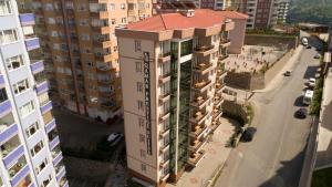 an aerial view of a building with a red roof at Qamar Prestige Suites in Trabzon