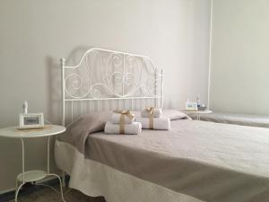 Katil atau katil-katil dalam bilik di B&B Piazza Viola