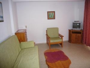 TV a/nebo společenská místnost v ubytování Miramar Playa - Fincas Arena