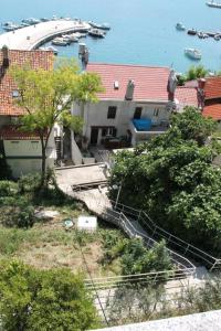 an aerial view of a house and a harbor at Apartments Andrea in Baška