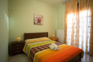 Posteľ alebo postele v izbe v ubytovaní Luxury Maisonette Afro