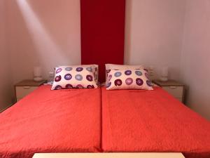 A bed or beds in a room at Mirtos Apartments