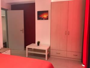 A bed or beds in a room at Mirtos Apartments