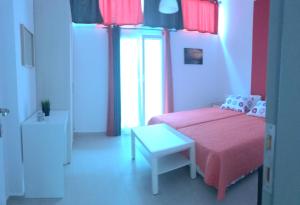 A bed or beds in a room at Mirtos Apartments