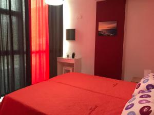 A bed or beds in a room at Mirtos Apartments