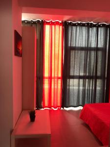 A bed or beds in a room at Mirtos Apartments