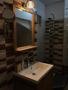 A bathroom at Mirtos Apartments