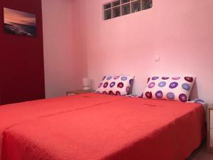 A bed or beds in a room at Mirtos Apartments