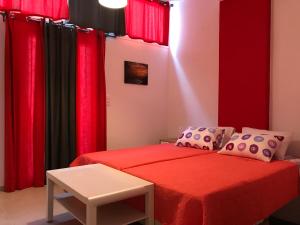 A bed or beds in a room at Mirtos Apartments