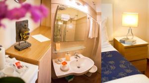 Koupelna v ubytování Hotel Martino Ai Monti + 33 fotografií