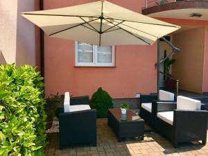 Posezení v ubytování Apartments Corina