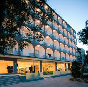 a large building with lights on the side of it at Hotel Cassandra in El Arenal