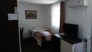 Televisor o centre d'entreteniment de Gros Hotel - Leskovac
