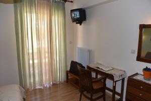 TV a/nebo společenská místnost v ubytování 40 Platania Hotel