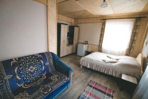 Postel nebo postele na pokoji v ubytování Skarbivka + 37 fotografií