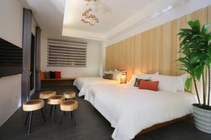 Krevet ili kreveti u jedinici u okviru objekta Qi Li Xiang Homestay