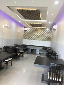 A restaurant or other place to eat at Roop Shree Hotel