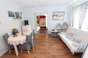 Ένα ή περισσότερα κρεβάτια σε δωμάτιο στο Apartments Villa Nikola