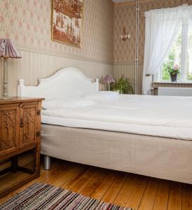 Postel nebo postele na pokoji v ubytování Enångers Bed and Breakfast