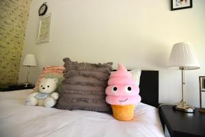 Postel nebo postele na pokoji v ubytování Hotel Biscuit