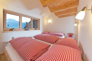 Ein Bett oder Betten in einem Zimmer der Unterkunft Martinshof
