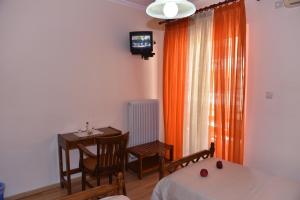 TV a/nebo společenská místnost v ubytování 40 Platania Hotel